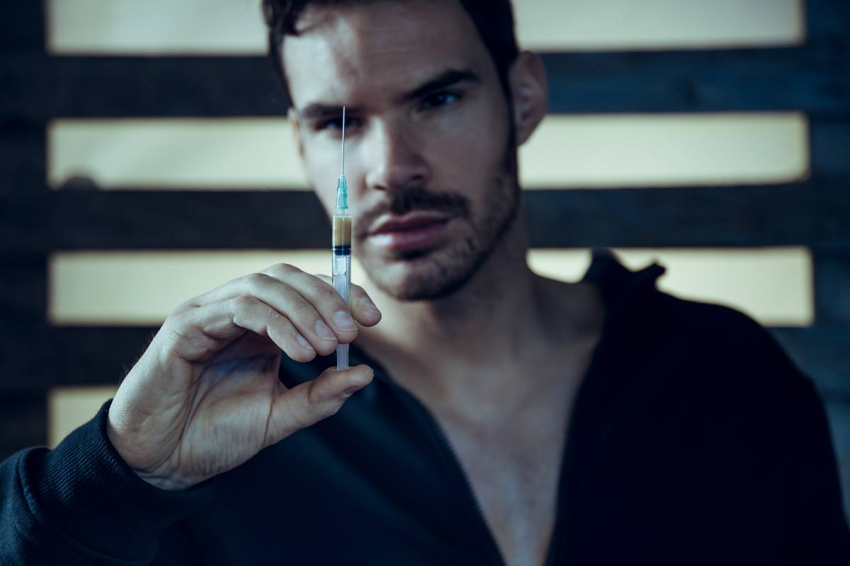 addicted man preparing his dose - southeastaddiction.com