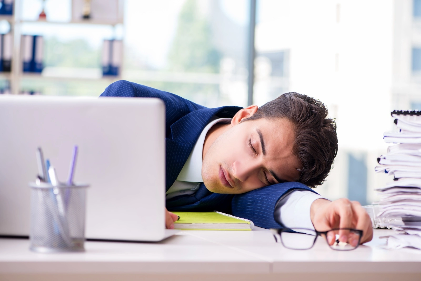 man experiences fatigue while suffering from adderall withdrawal
