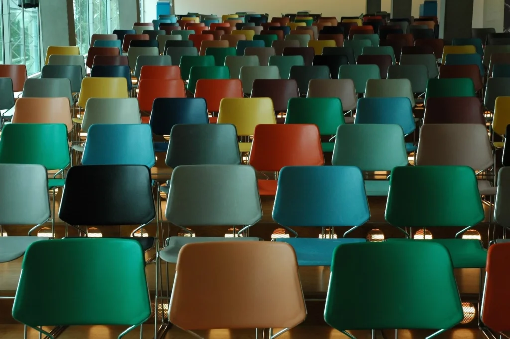how aa works; empty chairs in a classroom