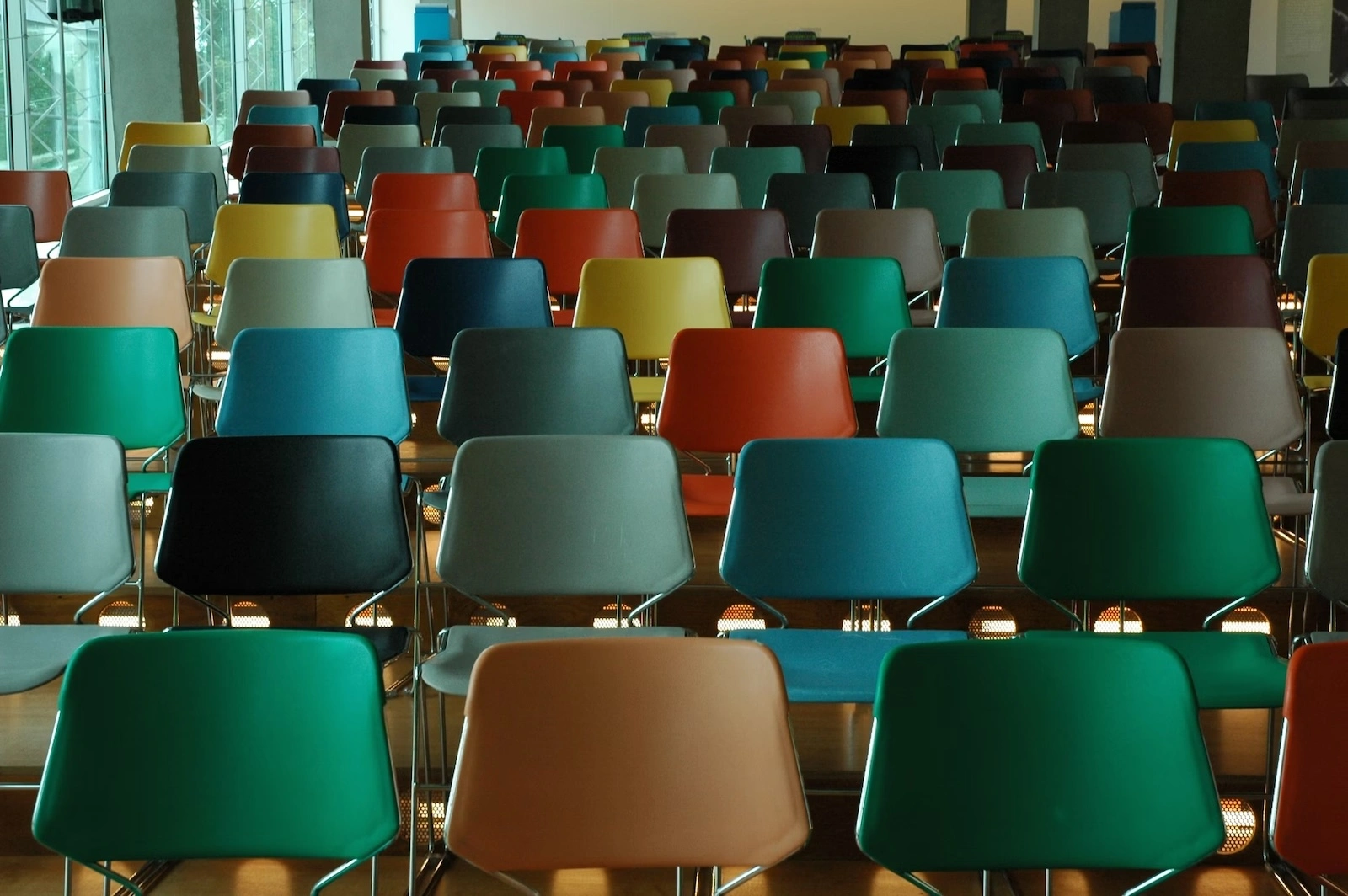 how aa works; empty chairs in a classroom