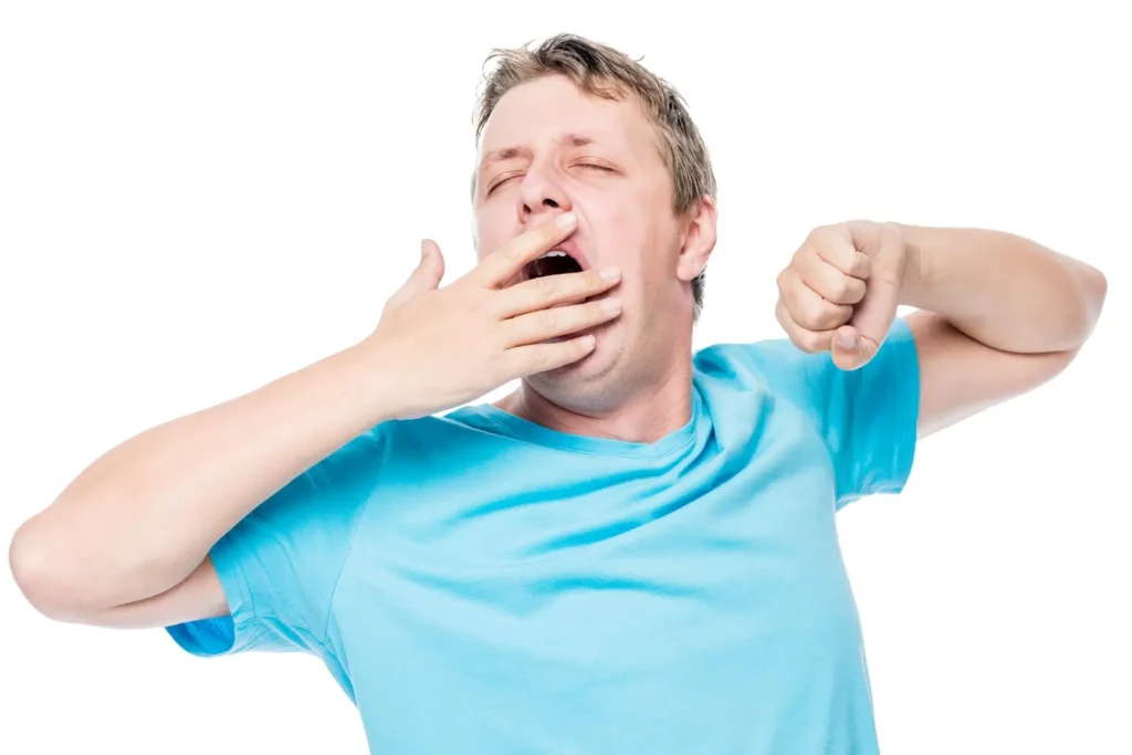 Do Muscle Relaxers Make You Sleepy? Sleepy person yawning.